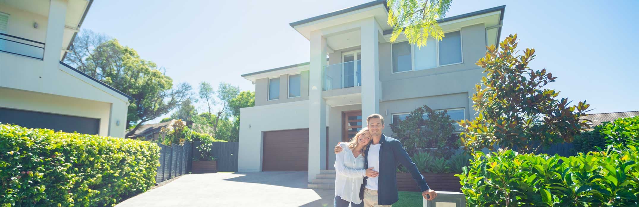 Couple at their new home